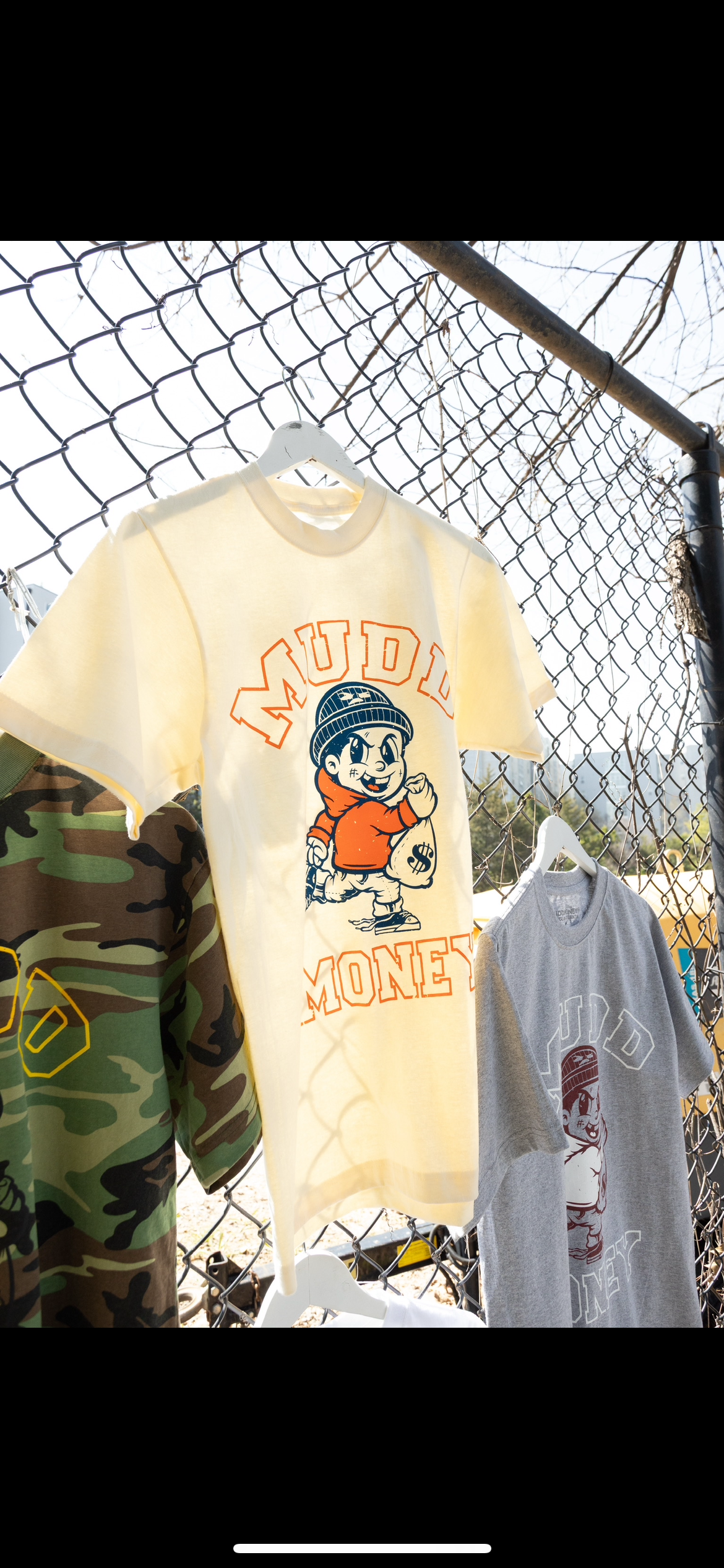 Cream Running Man tee